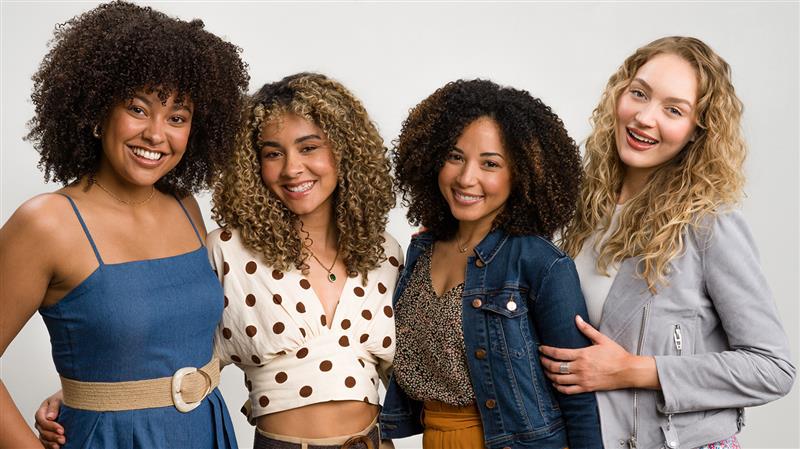 a group of women smiling
