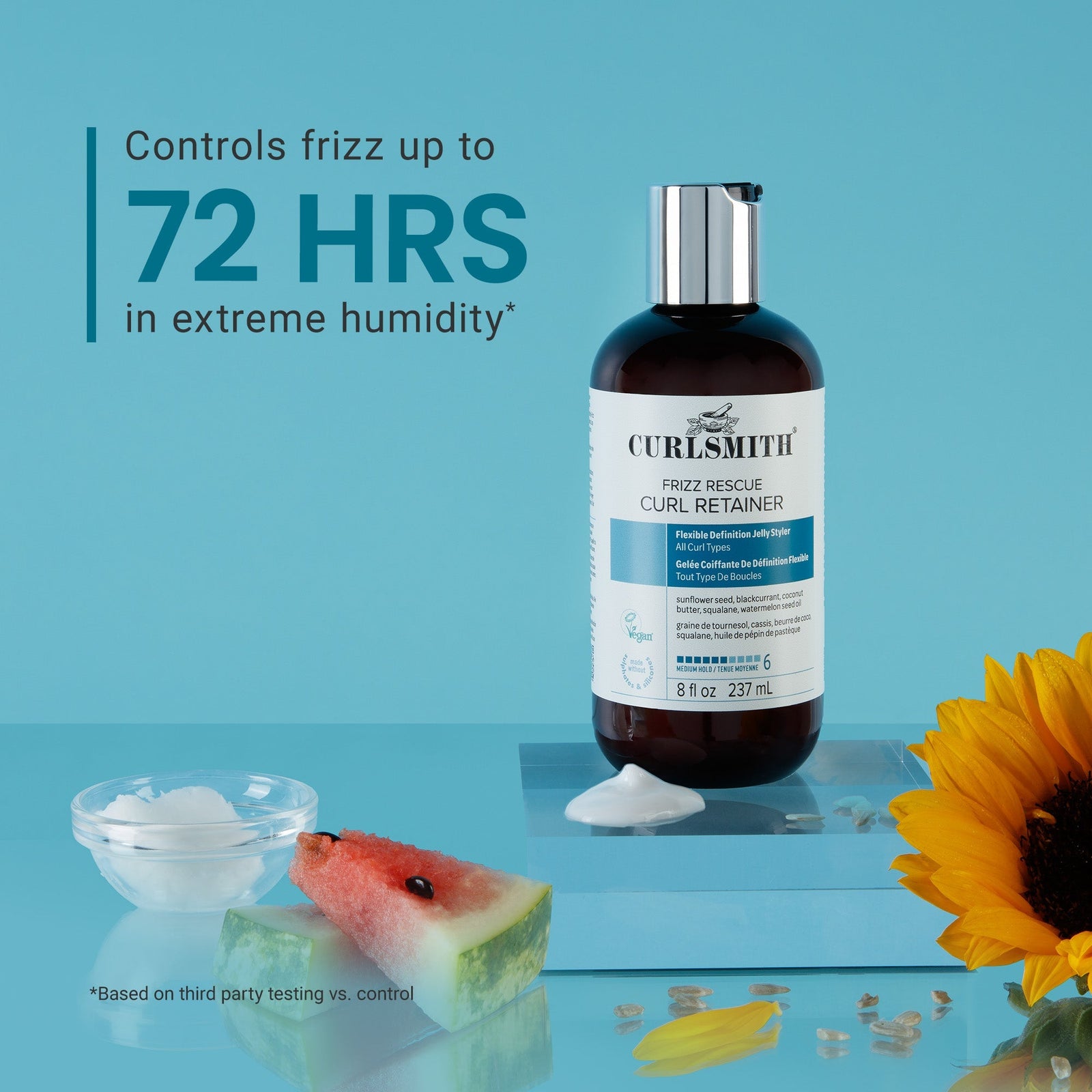 Curlsmith hair product bottle with text on a blue background, featuring a sunflower and watermelon.