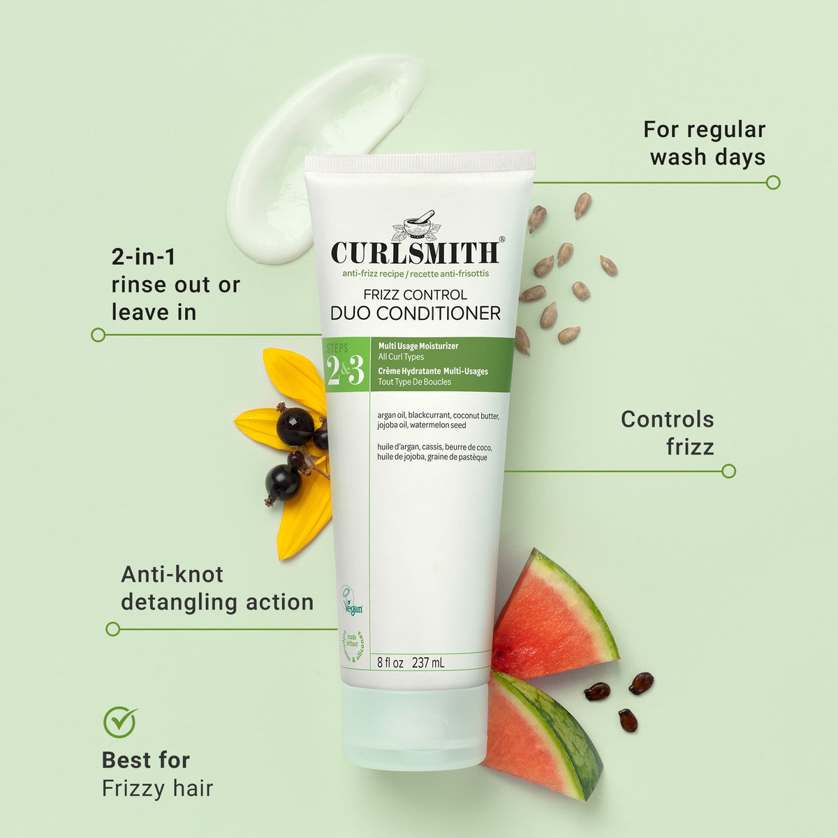 Curlsmith frizz control duo conditioner with watermelon slices and seeds on a green background