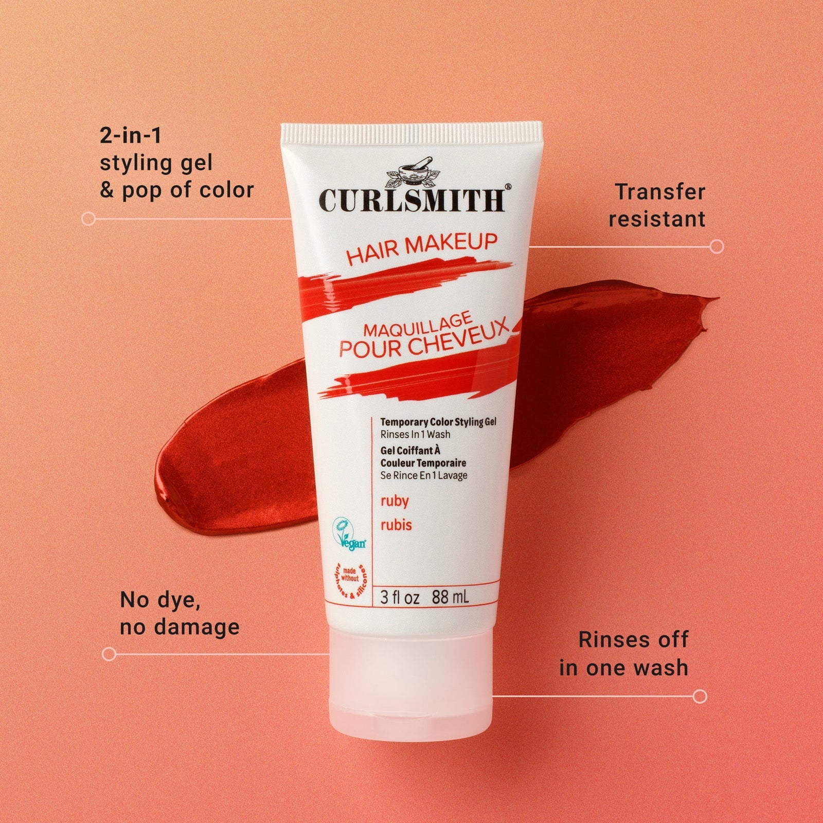 Curlsmith hair makeup tube on a peach background with product features highlighted.