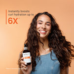 Woman holding a bottle of hair care product with text on an orange background