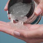Hand holding Curlsmith Curl Defining Styling Souflee